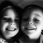 2 young kids smiling